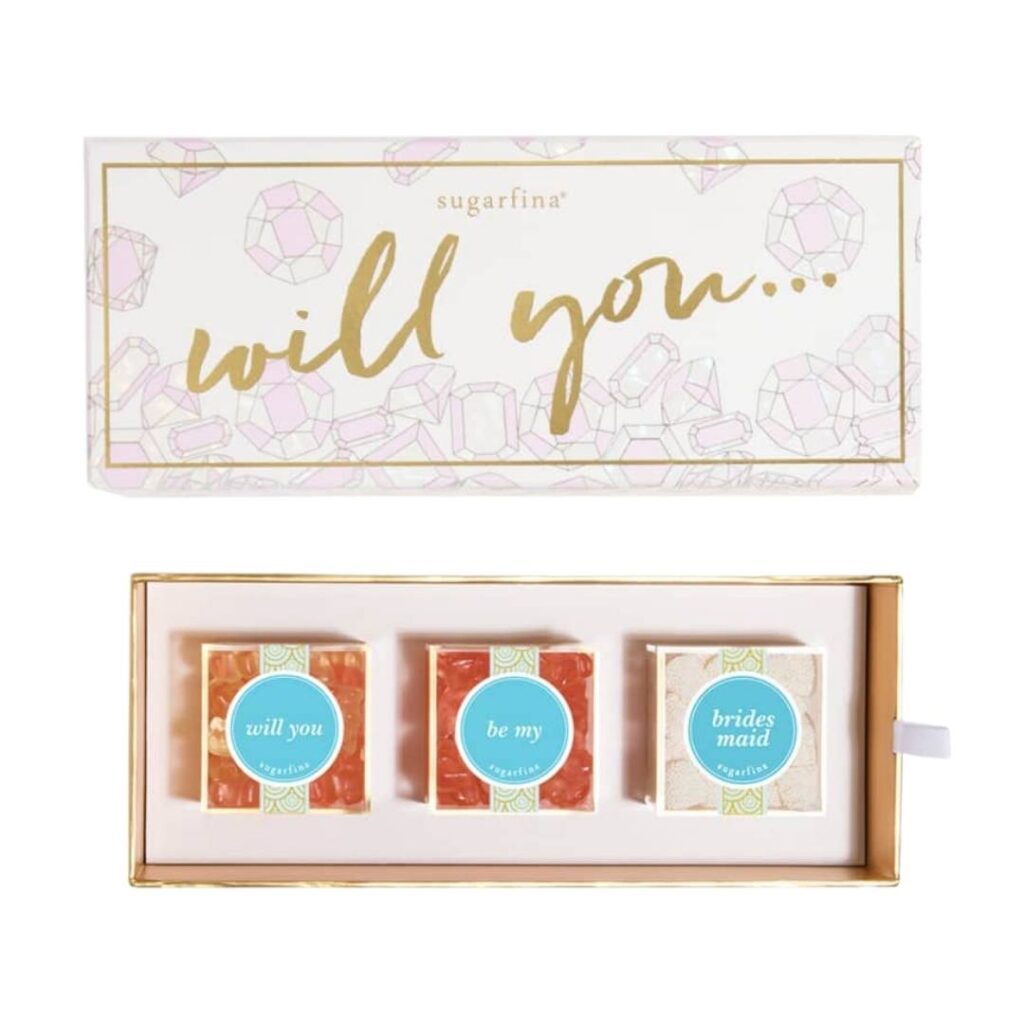 row of three candy boxes with will you be my