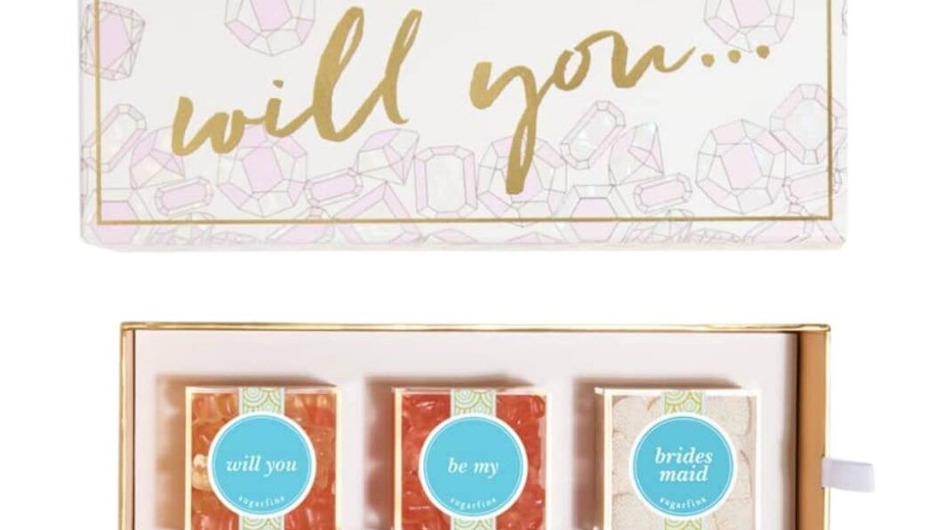 row of three candy boxes with will you be my