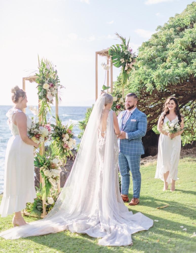 Lauren and Melis standing at the altar