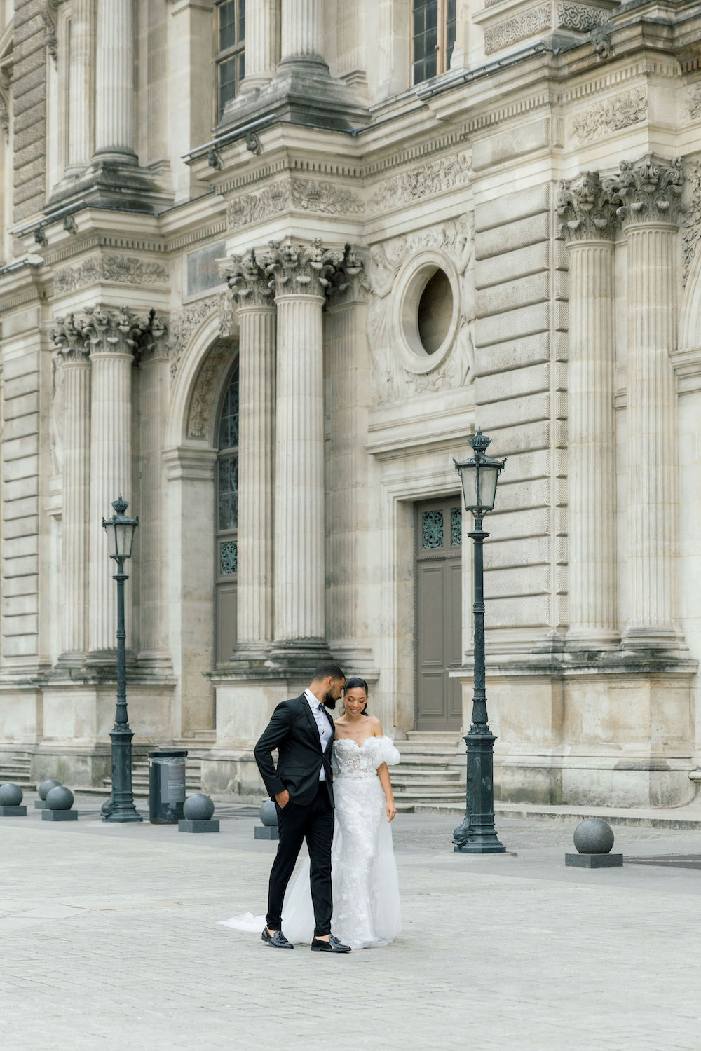 couple in Louvre square