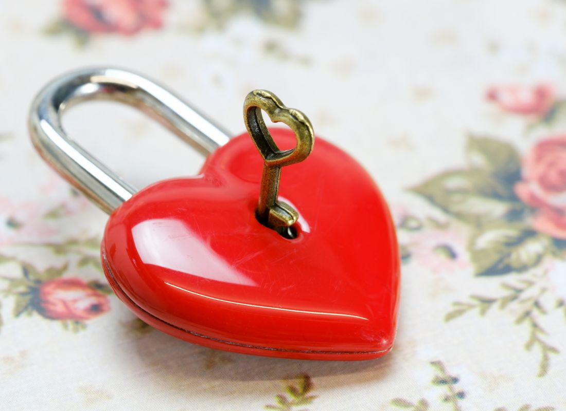 red heart lock with heart key