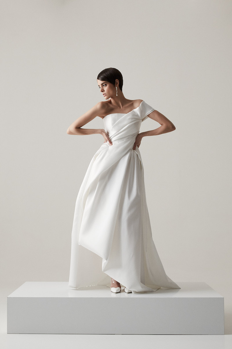 Model in off-shoulder wedding dress