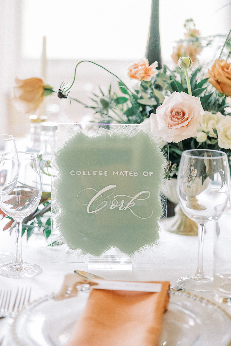 Wedding reception centerpiece with a personalized glass 