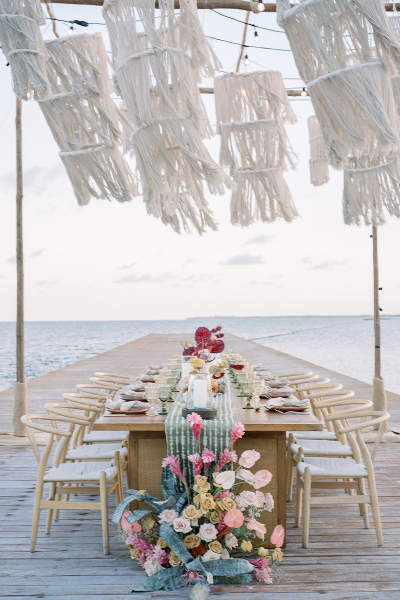 Fabric lanterns at a beach wedding reception