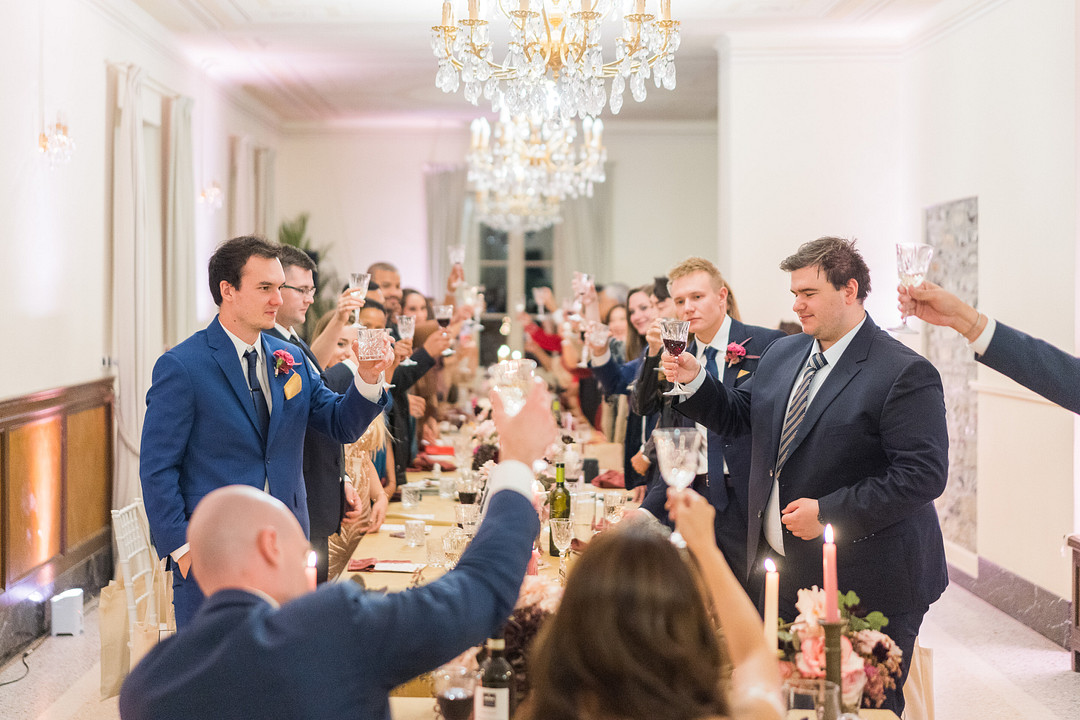 guests give couple toast