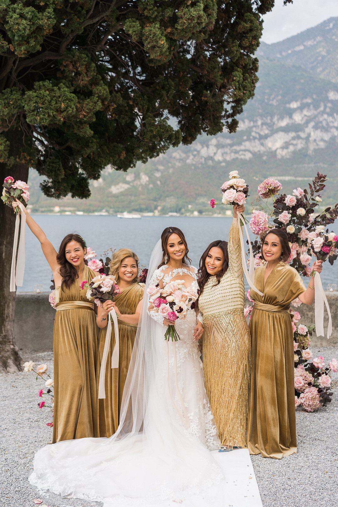 bride and bridesmaids with pink bouquets 