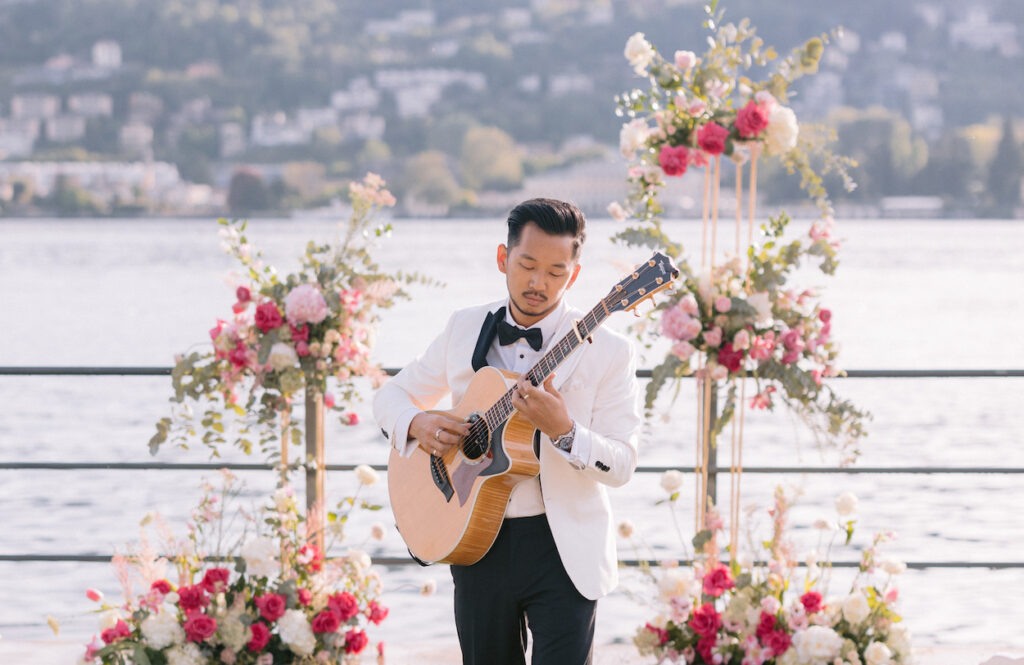 Wedding guitarist Moses Lin plays at a wedding ceremony