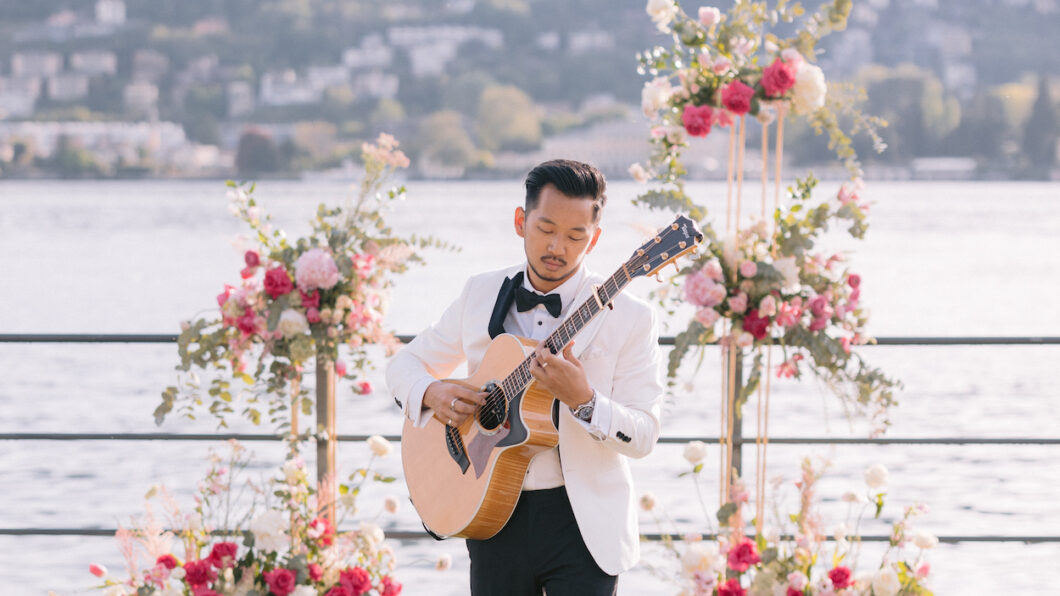 Wedding guitarist Moses Lin plays at a wedding ceremony