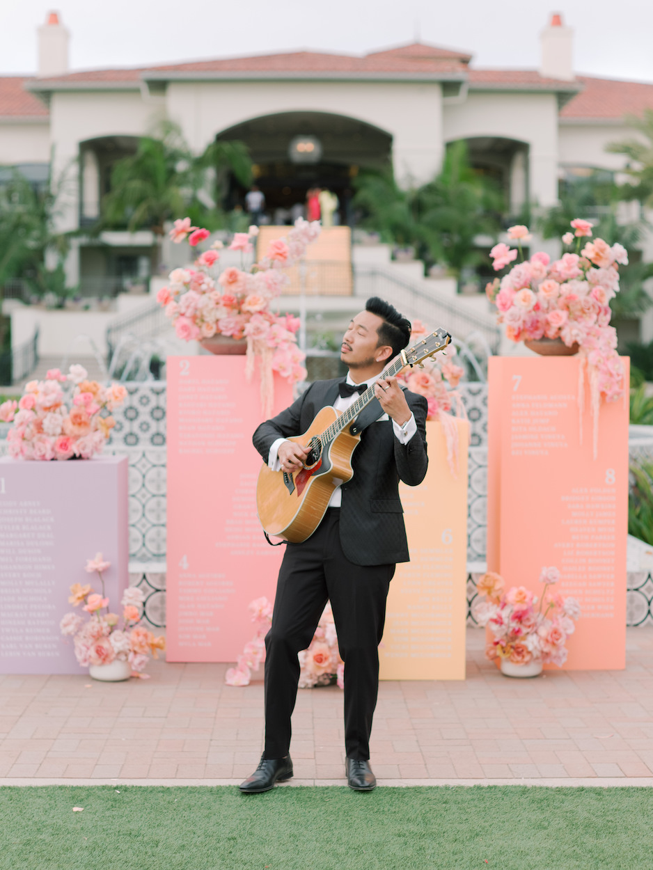 Acoustic guitar player Moses Lin at performing at wedding