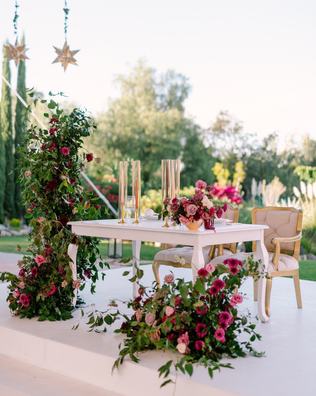 bride and groom's table with pink florals