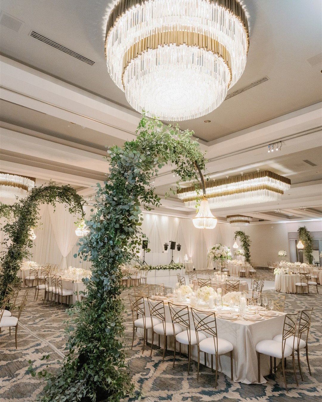 reception with chandeliers