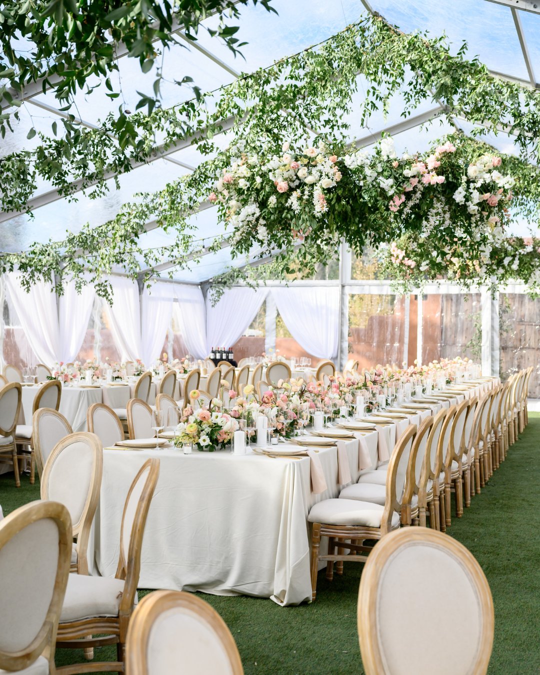 reception tent with overhanging florals