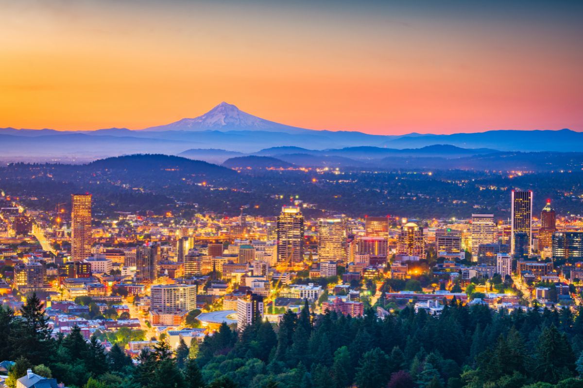 downtown Portland at sunset with mountain in background