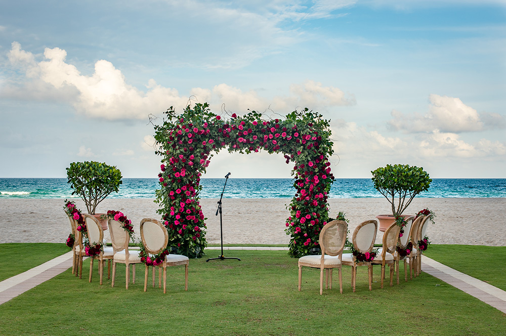 wedding arch with pink florals