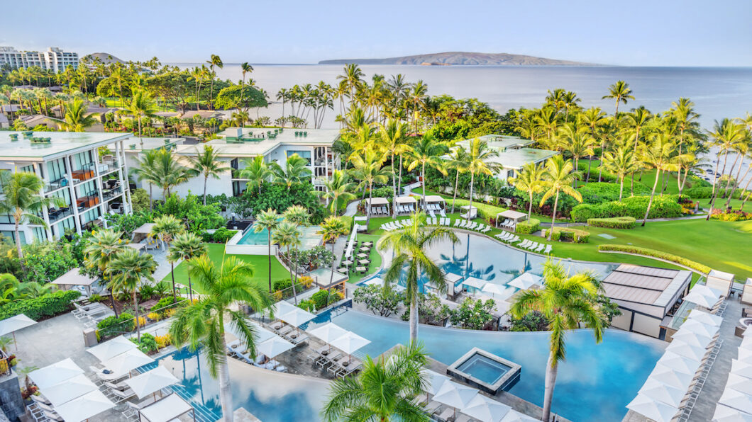 aerial view of Andaz Maui at Wailea Resort pool terraces with island in the distance
