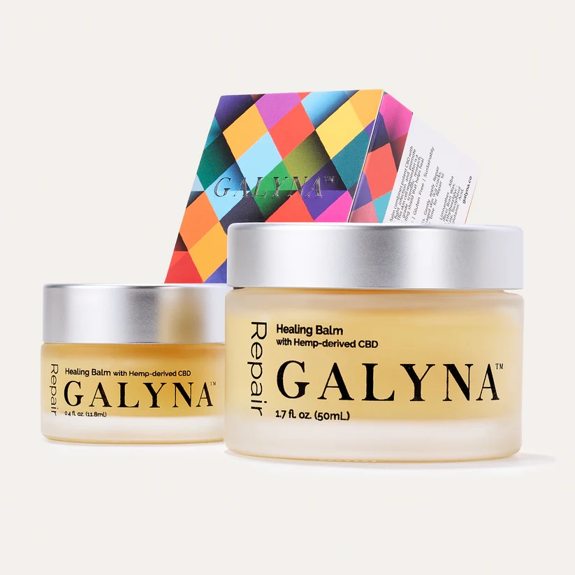 Two containers of Galynna Healing Balm with hemp-derived CBD on a white background. The larger container is white and labeled "Repair 1.7 fl oz. (50mL)". The smaller container is black and labeled "Repair 04 fl oz. (11.8ml)". Both containers have the Galynna logo and text that says "Healing Balm with Hemp-derived CBD".