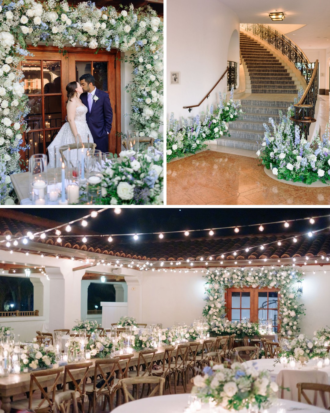 A couple stands beneath a large floral archway, kissing. The venue features elegantly decorated tables with candles and flowers, a staircase adorned with floral arrangements, and a canopy of string lights illuminating the banquet area.