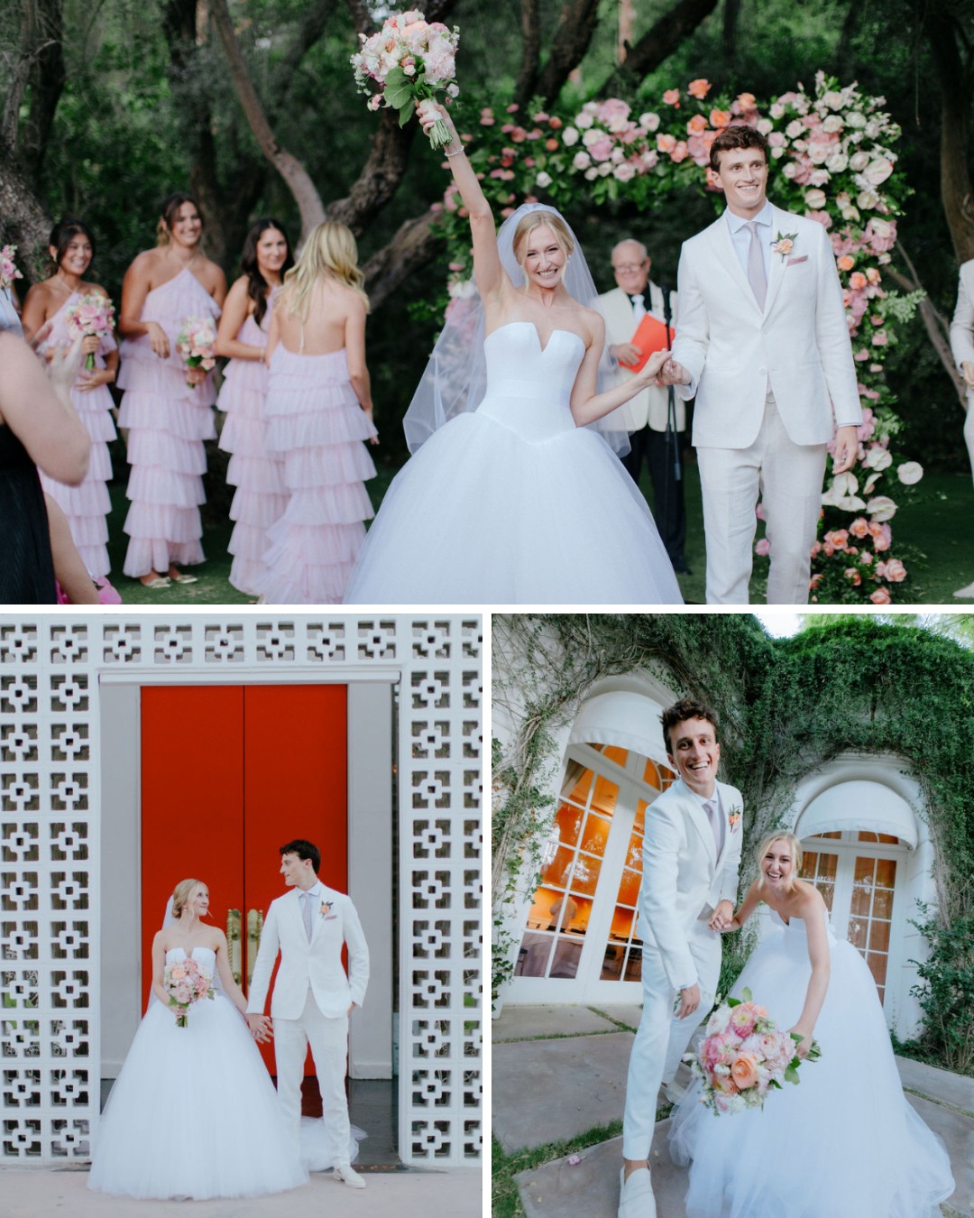 A bride and groom in white attire celebrate their wedding outdoors with a floral backdrop, accompanied by bridesmaids in pink dresses.