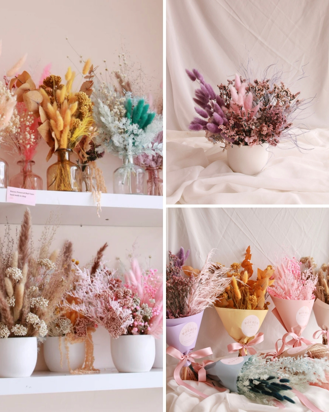 Various arrangements of dried flowers in pastel colors displayed in vases and pots on shelves and draped fabric.