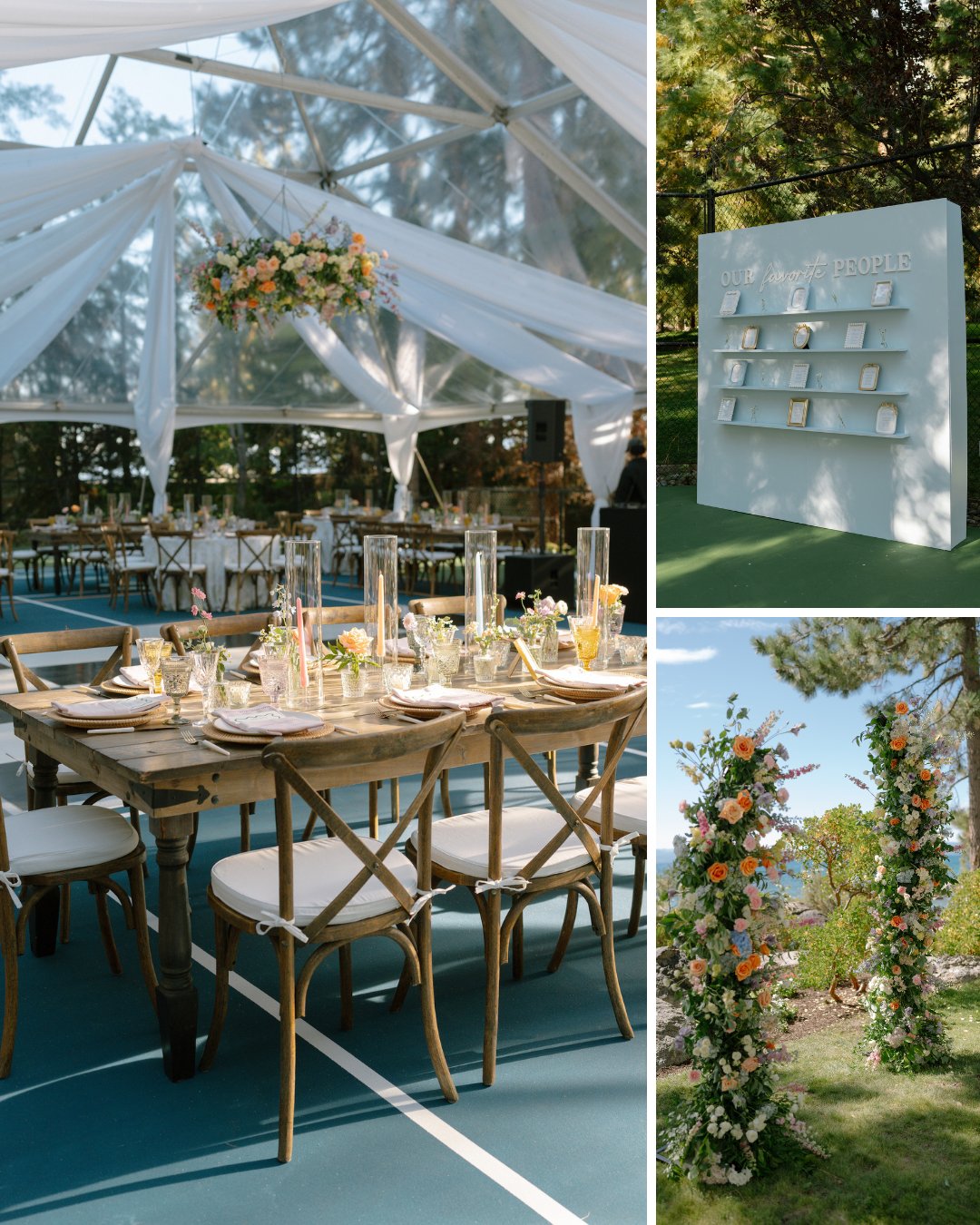 Outdoor event setup with wooden tables and chairs under a clear tent, a white shelving unit display, and a floral arch, all on a blue court with greenery in the background.