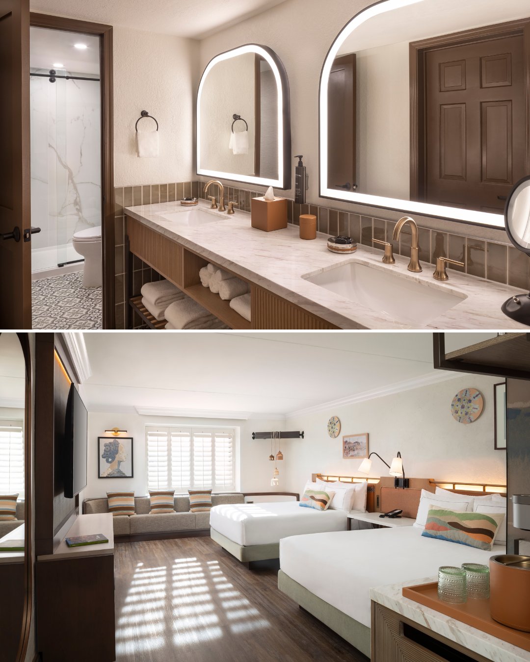 A hotel suite features a double-sink bathroom with a lit mirror and a bedroom with two beds, seating area, and modern decor.