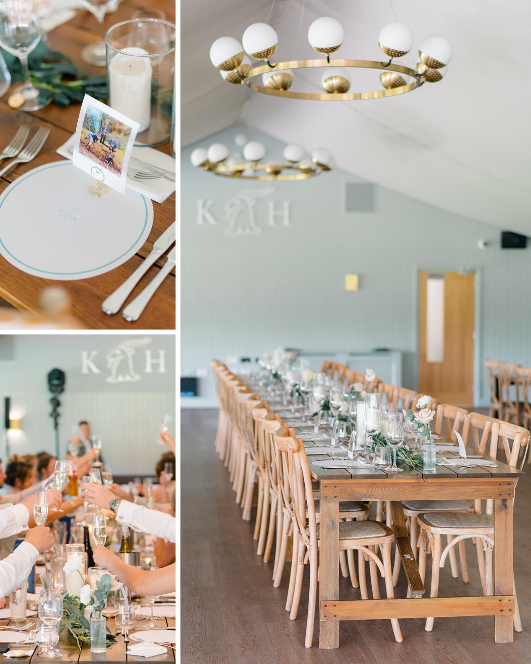 A long wooden table set for a formal event with plates, cutlery, and greenery centerpieces, under modern round chandeliers in a bright room.