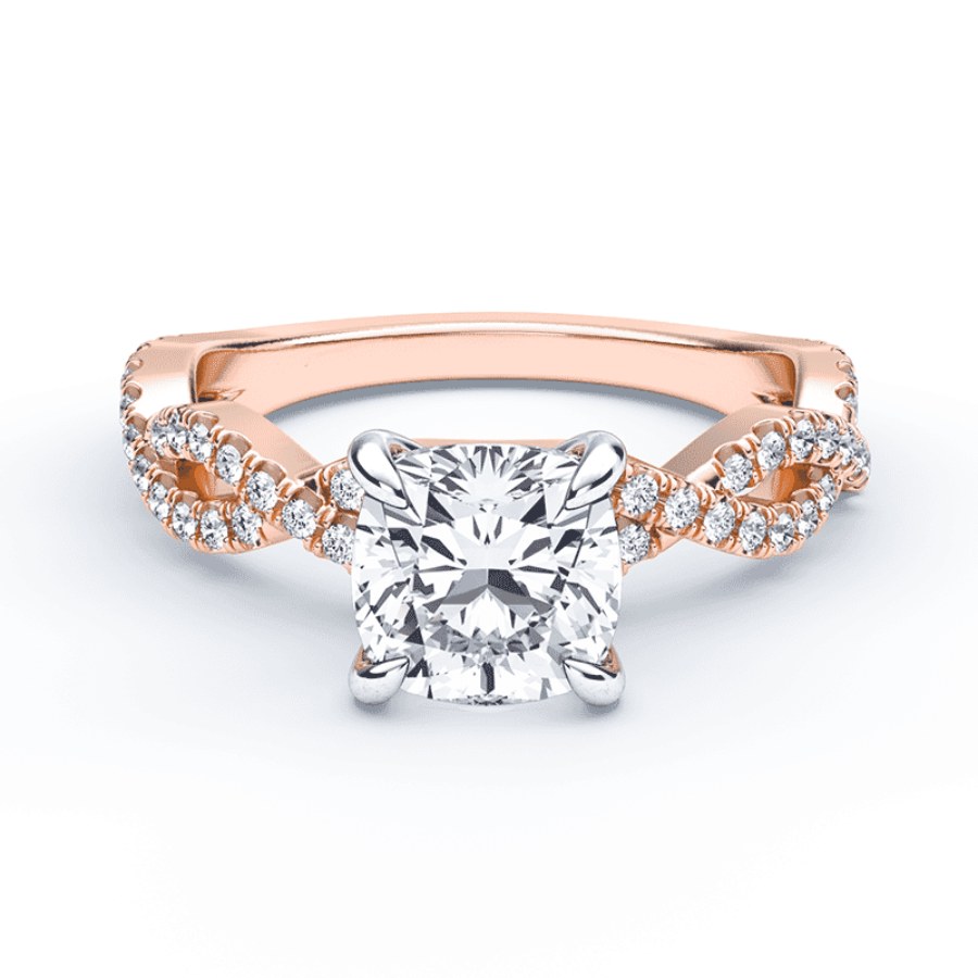 A rose gold ring with a central square-cut diamond and a twisted band adorned with smaller round diamonds.