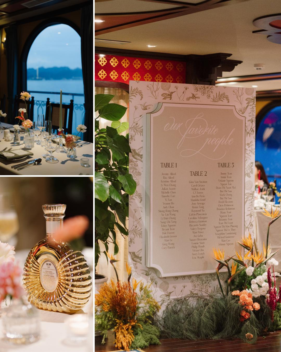 A decorated wedding reception with a large seating chart, elegantly set tables, floral arrangements, and a bottle of cognac on display.
