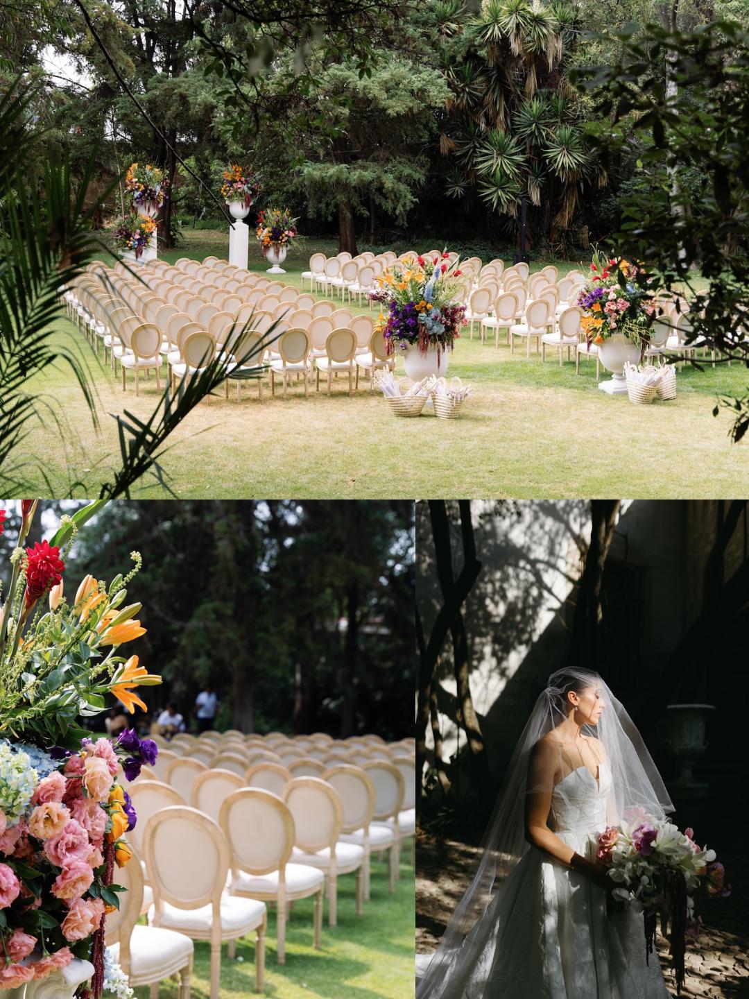 Rows of white chairs and floral arrangements set outdoors for a wedding ceremony, with a bride in a white dress and veil standing nearby.