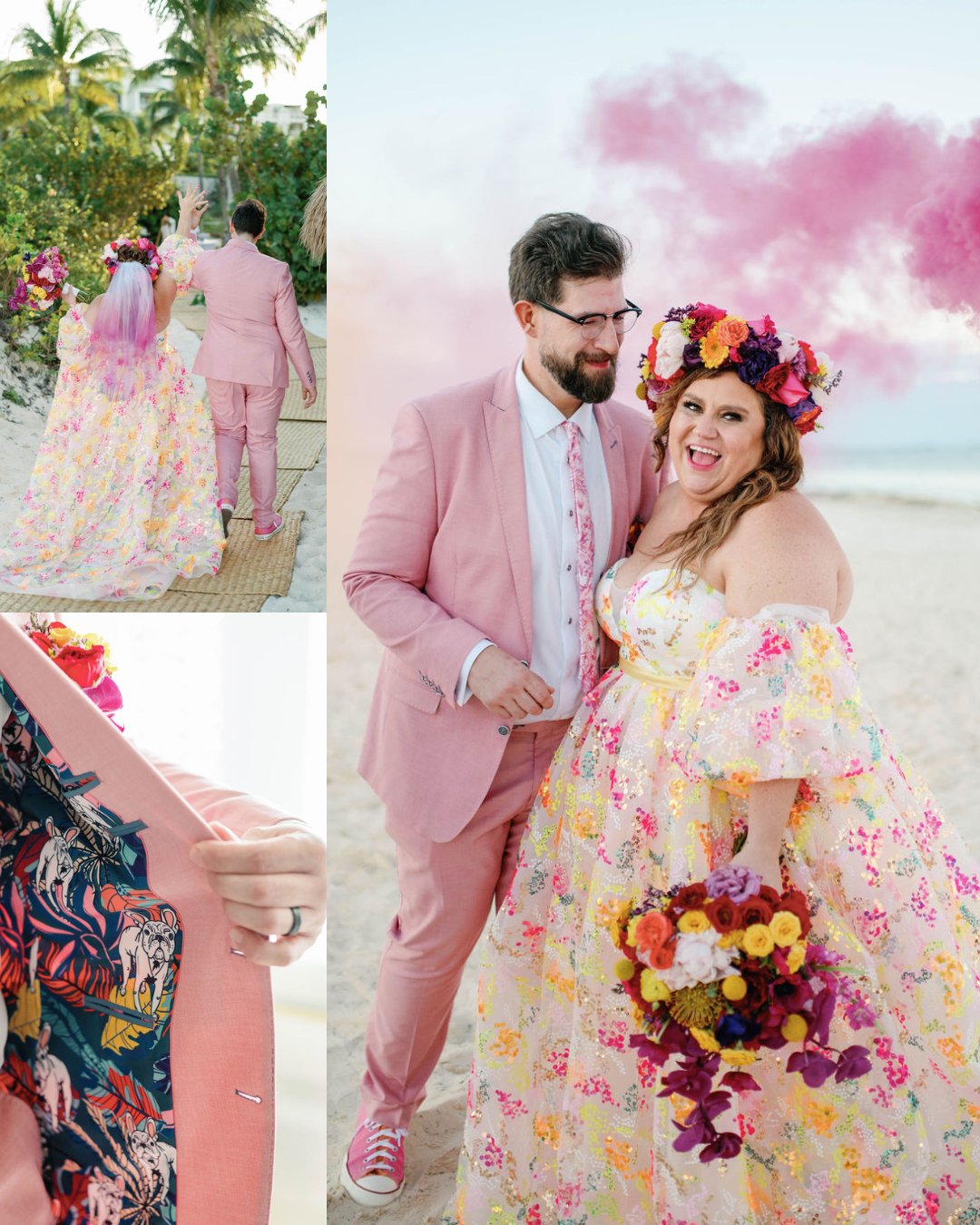 A couple poses on the beach; the man wears a pink suit and the woman wears a floral gown with a colorful flower crown. Pink smoke is in the background.