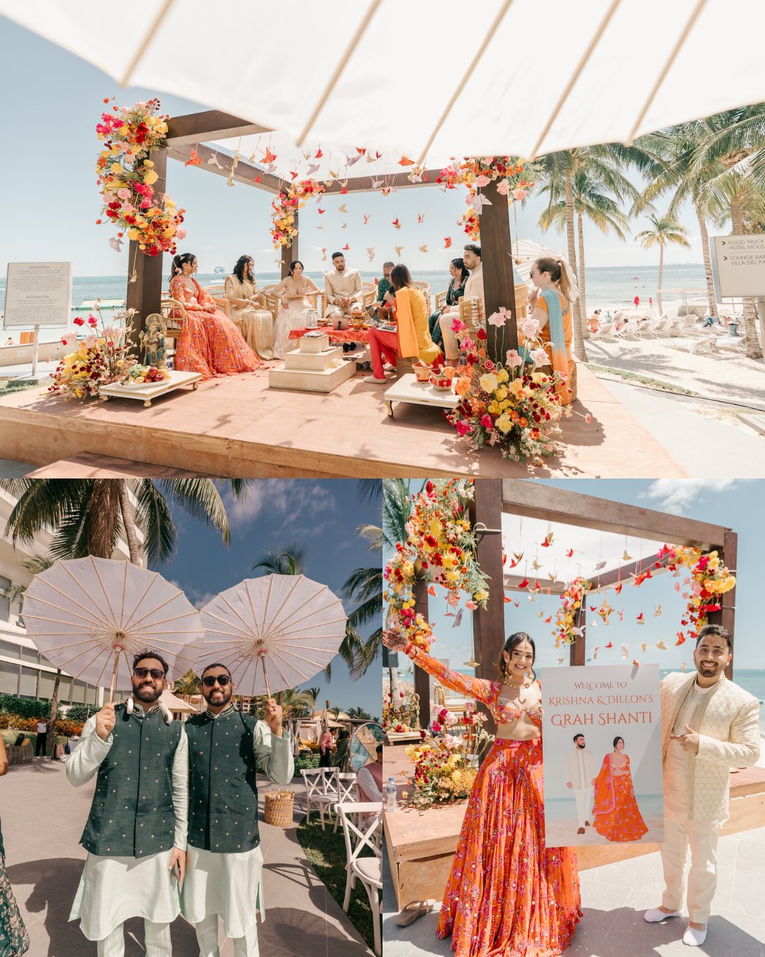 A beachfront wedding ceremony setup with colorful flowers, guests in traditional attire, and two men holding white parasols under a sunny sky with palm trees.