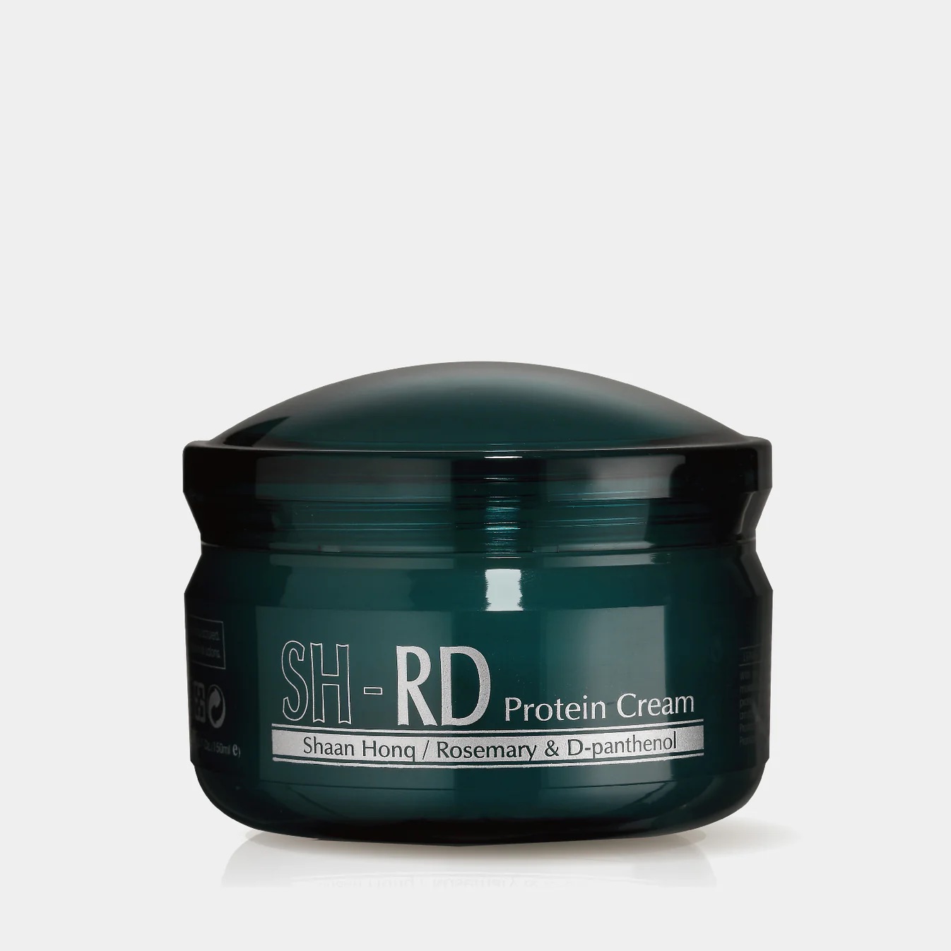 A dark green jar labeled "SH-RD Protein Cream Shaan Hong / Rosemary &amp; D-panthenol" with a domed lid, placed against a plain white background.