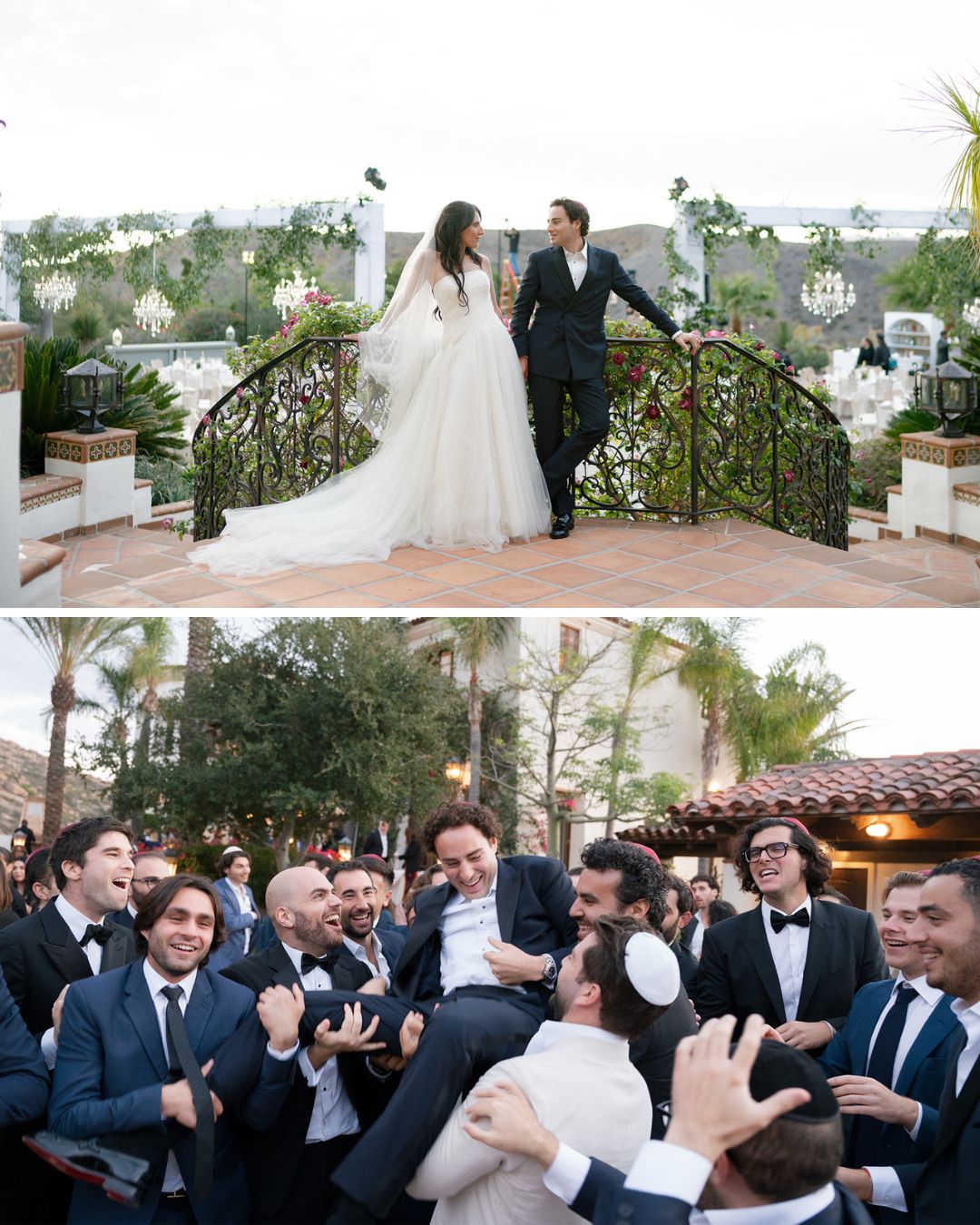 A bride and groom stand on a bridge; below, the groom is lifted by a group of men in suits during an outdoor wedding celebration.