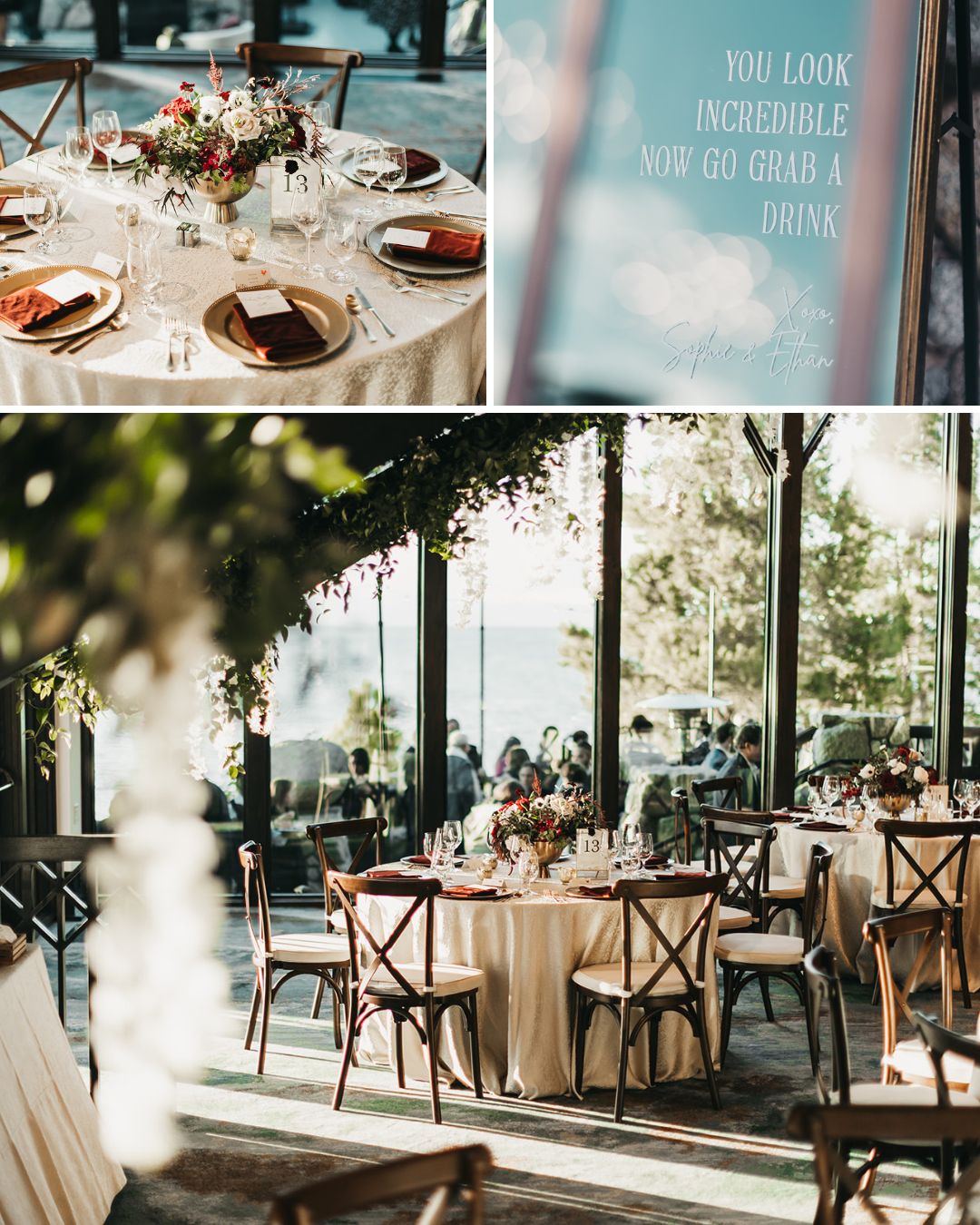 Elegant indoor wedding setup with round tables, gold plates, floral centerpieces, and wooden chairs. A sign reads, “You look incredible, now go grab a drink.” Large windows show outdoor scenery.