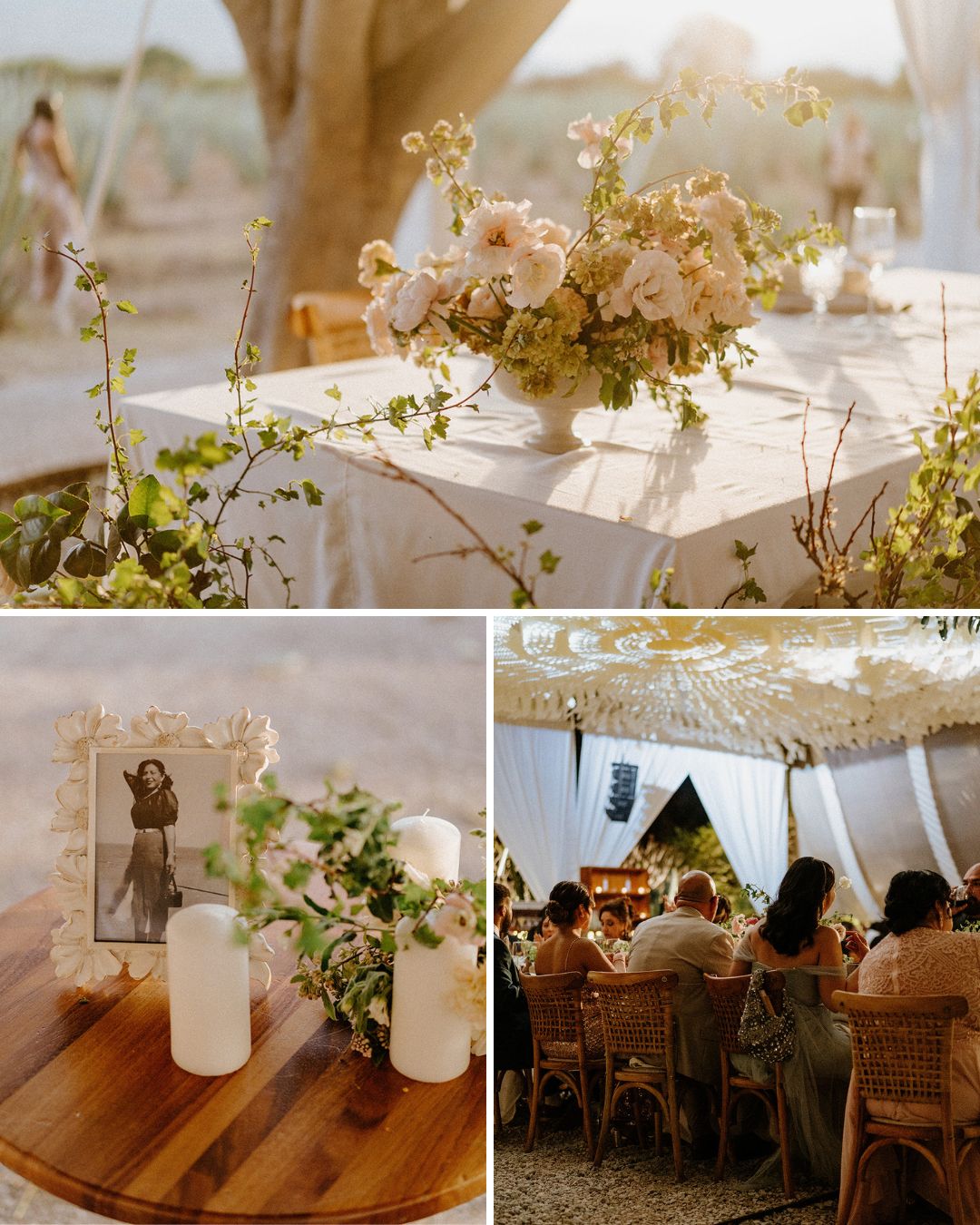 Outdoor wedding reception with floral centerpieces, candles, a framed photo, and guests seated under a canopy.