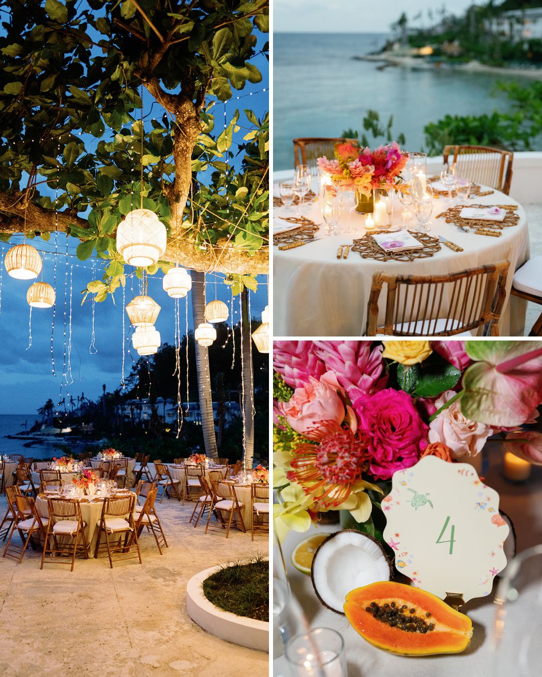 Outdoor oceanfront event setup with round tables, hanging lanterns, tropical floral centerpieces, and a place card displayed with half a papaya.