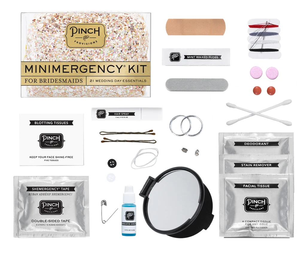 Contents of a Pinch Provisions bridesmaid emergency kit, including beauty, sewing, and hygiene supplies laid out on a white background.