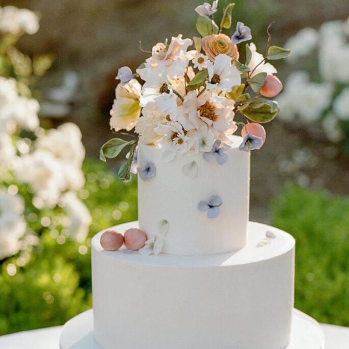 two tier wedding cake with florals