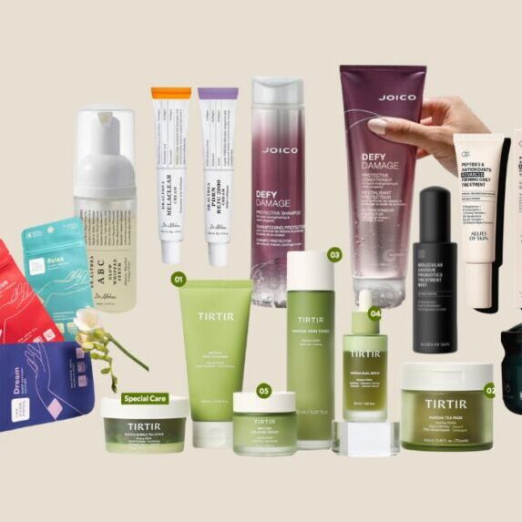 A variety of skincare and haircare products, including creams, serums, masks, and shampoos from brands like JOICO and TIRTIR, arranged against a plain background.